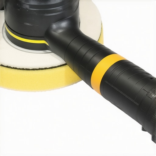 A professional detailer preparing to polish a car with a dual-action polisher in a workshop.